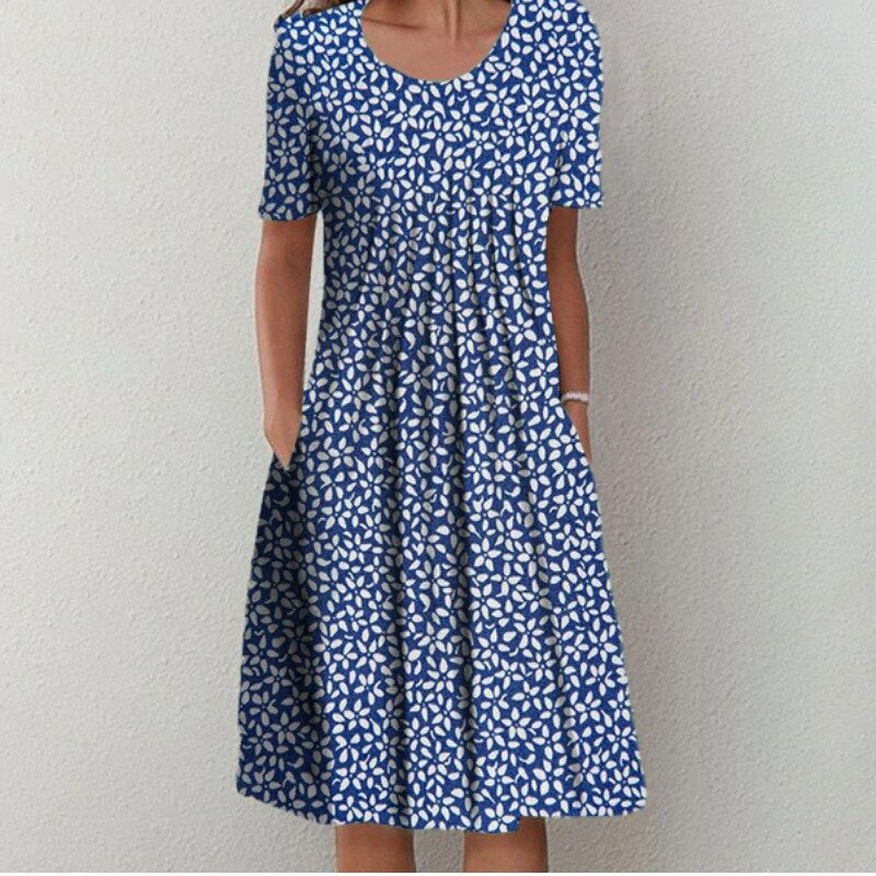 Alissa – Elegantes Blumenkleid mit Bauchbedeckung